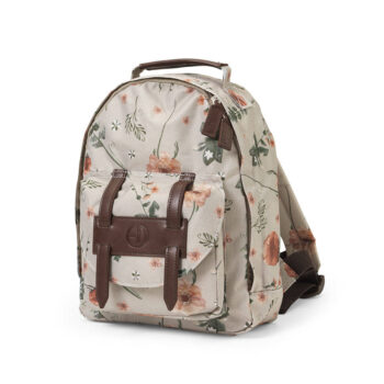 Plecak dziecięcy w jasnym kolorze w kwiatowy wzór z brązowymi paskami i uchwytem. Elodie Details Plecak BackPack MINI Meadow Blossom