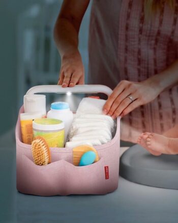 Różowy organizer na pieluchy z uchwytem z przegródkami na akcesoria dla niemowlaka. Skip Hop Light Up Diaper Caddy- Pink Heather eather Pink