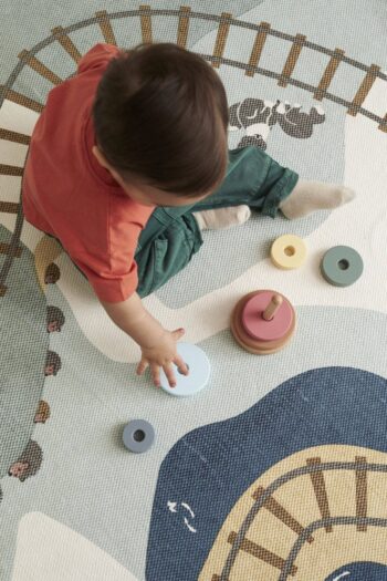 Drewniany zestaw pierścieni do układania w pastelowych kolorach dla dziecka. Kid’s Concept Zestaw pierścieni do układania EDVIN