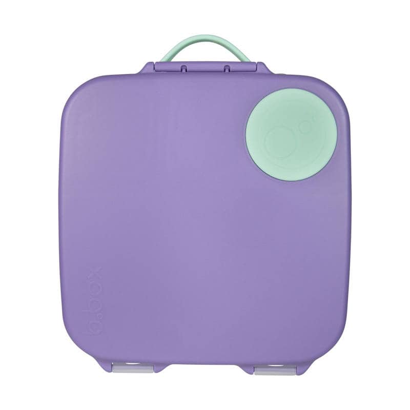Fioletowa śniadaniówka z uchwytem i okrągłym zielonym elementem dla dziecka. b.box Lunchbox Lilac Pop