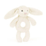 Kremowy pluszowy króliczek grzechotka dla niemowlaka. Jellycat Króliczek Kremowy Grzechotka 18 cm