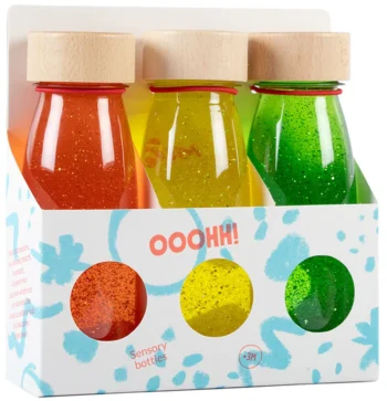 Zestaw trzech sensorycznych butelek w kolorach czerwonym żółtym i zielonym z drewnianymi nakrętkami dla małego odkrywcy. Petit Boum Zestaw 3 Butelek sensorycznych FLOAT ZMIERZCH