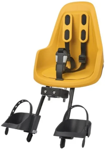 Żółty fotelik rowerowy dla dziecka z pasami bezpieczeństwa i podnóżkami. Bobike One Fotelik row. mini mighty Mustard