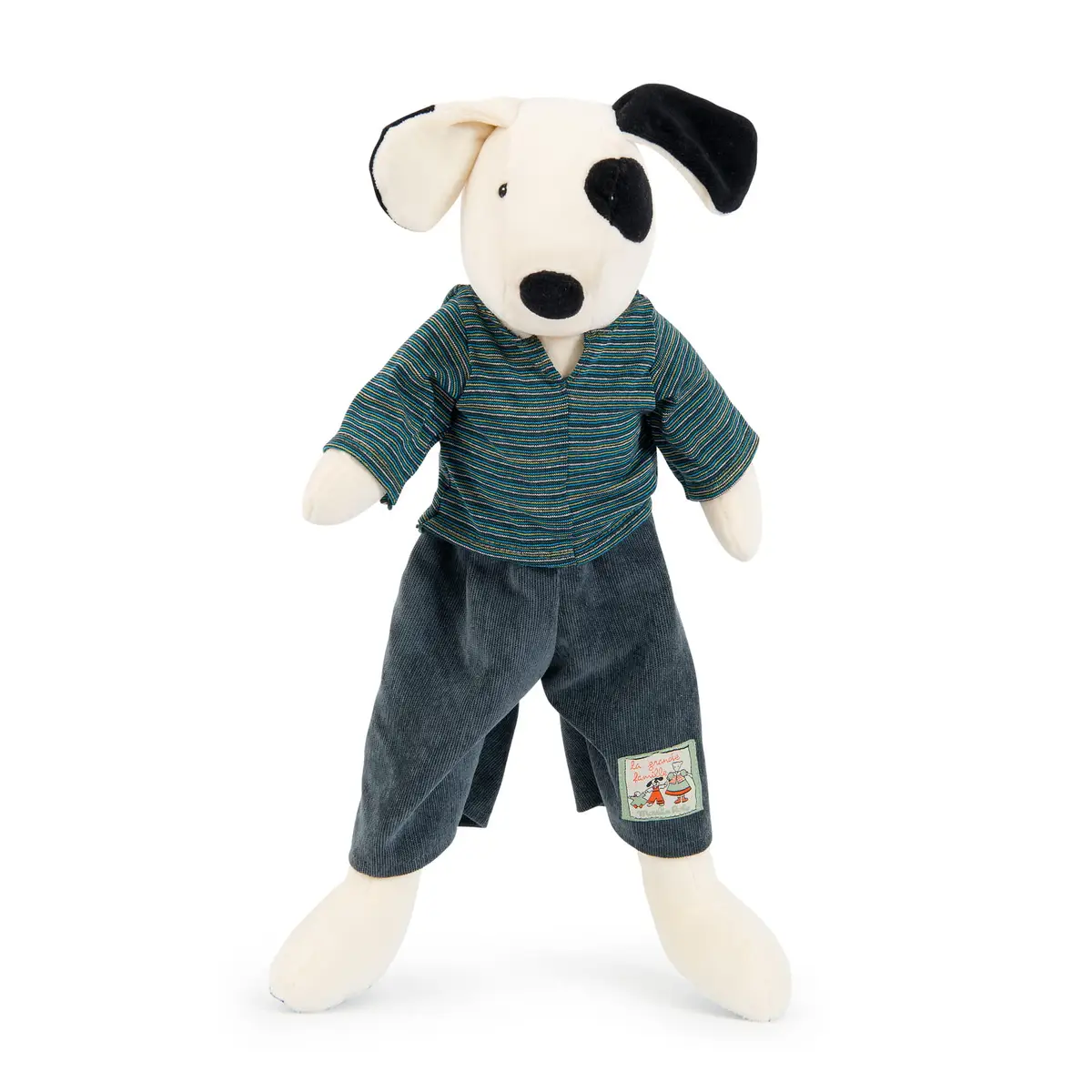 Pluszowy biały piesek z czarną łatą na oku ubrany w zieloną bluzkę i szare spodnie dla dziecka. Moulin Roty Pluszowy pies Julius 50cm