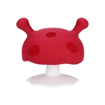 Czerwony gryzak w kształcie grzybka dla niemowlaka z białą podstawą. Mombella Gryzak Grzybek Mushroom Chimney Red