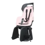 Różowy fotelik rowerowy na bagażnik z pasami bezpieczeństwa dla dziecka. Bobike Fotelik row. GO RS bagażnik Candy Pink