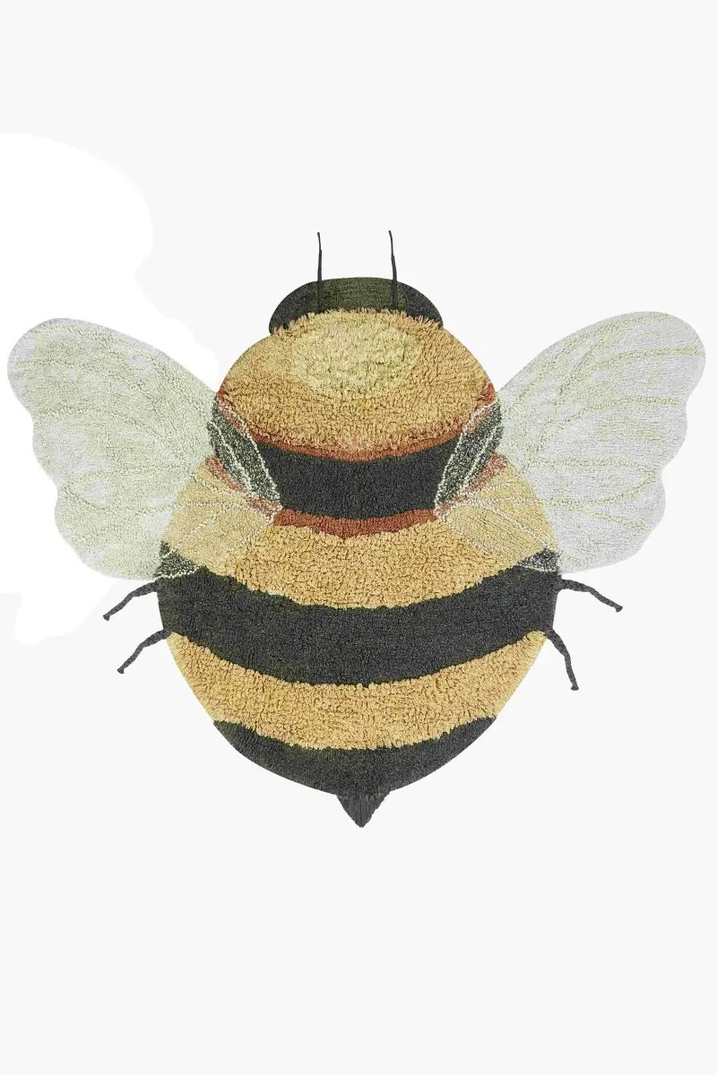 Dywan bawełniany w kształcie pszczoły z żółto-czarnymi paskami i białymi skrzydłami dla dzieci. Lorena Canals Dywna bawełniany Bee do prania w pralce Planet Bee