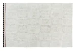 Wełniany dywan w jasnym kolorze z delikatnym wzorem i kolorową lamówką 200x300 cm. Lorena Canals Dywan Wełniany Bahari 200x300cm