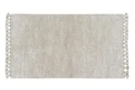 Wełniany dywan w kolorze piaskowym z frędzlami 80x140 cm. Lorena Canals Dywan wełniany Koa Sandstone 80x140cm