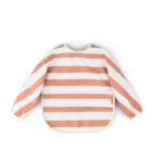 Śliniak z długimi rękawami w poziome pomarańczowo-białe paski dla dziecka. Done by Deer Śliniak z Rękawami Stripes Papaya