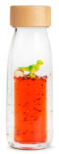 Butelka sensoryczna dwufazowa z zielonym dinozaurem i czerwonym płynem dla dziecka. Petit Boum Butelka sensoryczna dwufazowa MOVE T-Rex