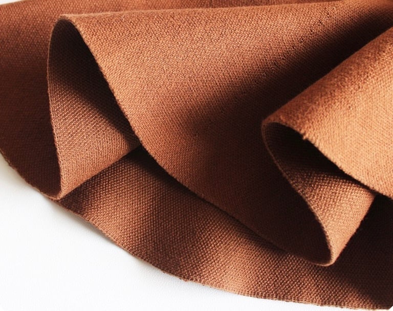 Brązowa rozkloszowana dzianinowa spódnica materiał. Fig&Pear Brązowa rozkloszowana dzianinowa spódnica