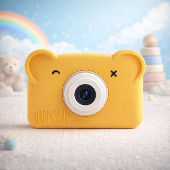Żółty aparat fotograficzny dla dzieci w kształcie misia z obiektywem na środku i uroczymi oczami na obudowie. Hoppstar Aparat fotograficzny dla dzieci Rookie Honey