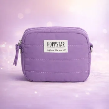 Fioletowa dziecięca torebka na aparat z materiału pikowanego dla dziecka. Hoppstar Torebka Dziecięca na Aparat Mini Blossom