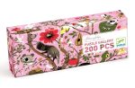 Pudełko puzzli tradycyjnych 200 elementów z kolorowym wzorem zwierząt na różowym tle dla dzieci powyżej 6 lat. Djeco Puzzle Tektur. ABRACADABRA 200 Elem. +6 lat