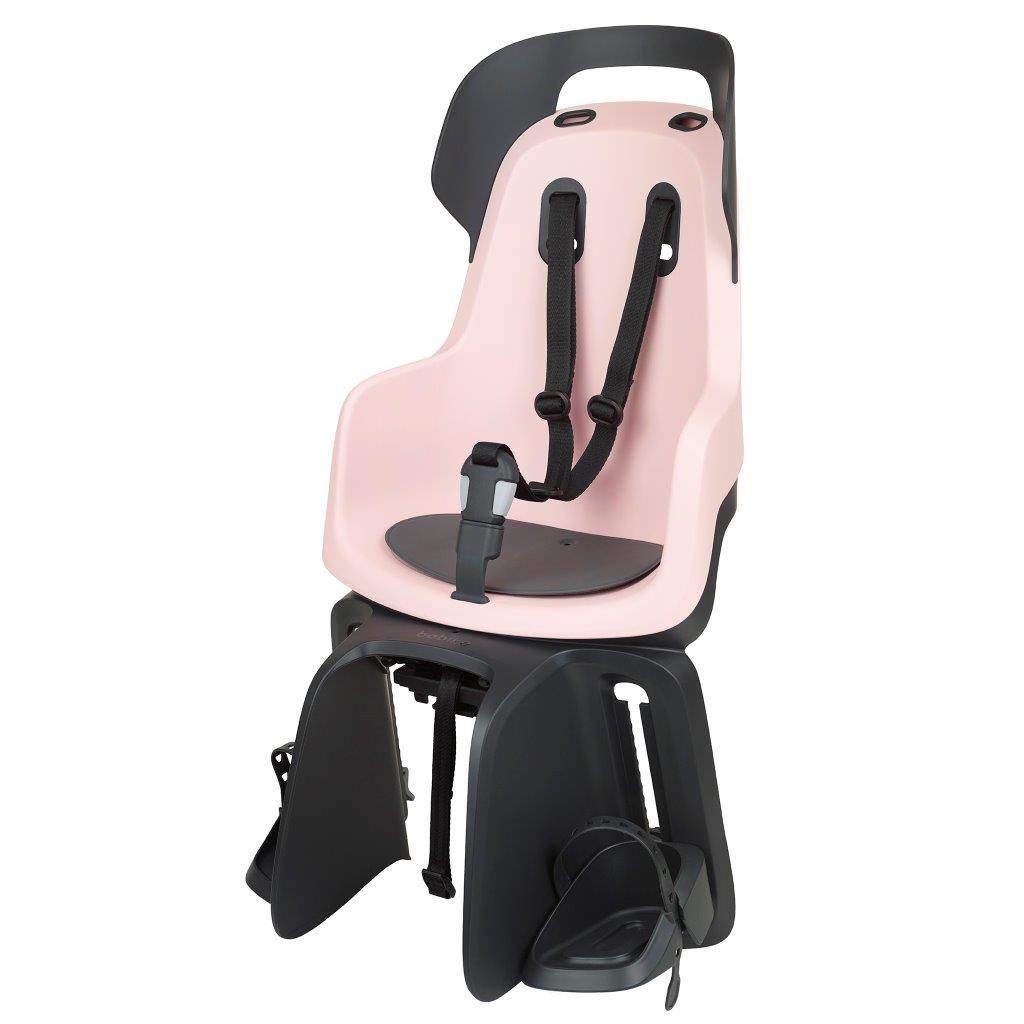Fotelik rowerowy dla dziecka różowy montowany na bagażnik z pasami bezpieczeństwa i podnóżkami. Bobike Fotelik row. GO bagażnik MIK HD Candy Pink
