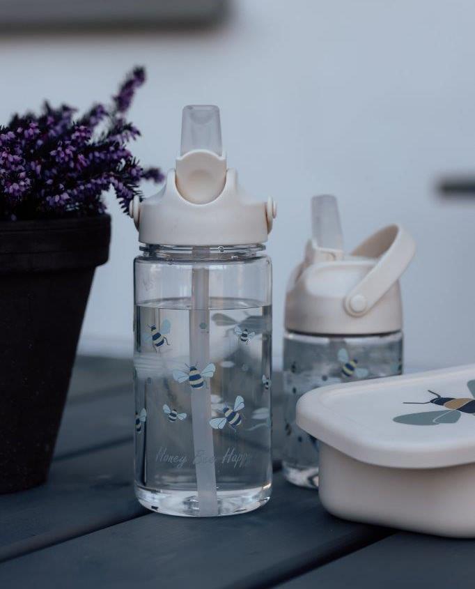 Przezroczysta butelka do picia z tworzywa Tritan z białą słomką i motywem pszczół dla dziecka. Vanilla Copenhagen Butelka do picia Tritan HONEYBEE 500 ml ze słomką