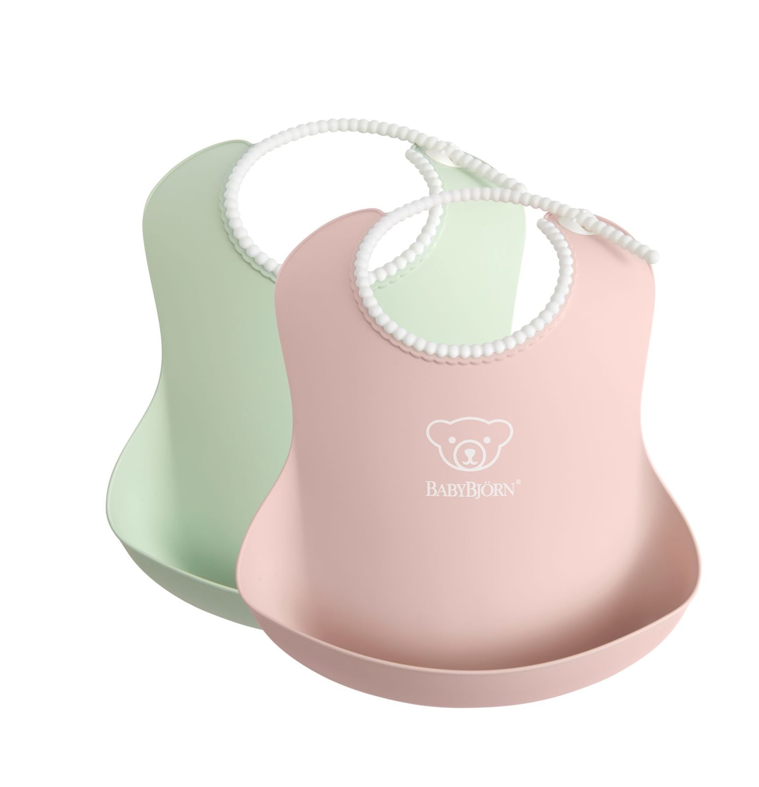Dwa duże silikonowe śliniaki w kolorze jasny zielony i jasny różowy dla dziecka. Babybjorn 2 duże śliniaki Powder Green/ Powder Pink