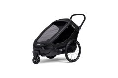 Czarna przyczepka rowerowa dla dzieci z siateczką i dużymi kołami. Hamax przyczepka rowerowa Outback Next black