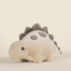 Pluszowy dinozaur stegozaur w jasnobeżowym kolorze z szarymi detalami dla dziecka. Bellzi Steggi Pluszowy Dinozaur Stegozaur