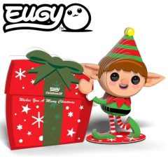 Trójwymiarowa układanka elf w zielono-czerwonym stroju stojący obok czerwonego prezentu z zieloną kokardą dla dzieci. Eugy Elf Eko Układanka 3D