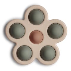 Sensoryczna zabawka kwiatek pop it w kolorze beżowym z zielonymi i różowym elementami dla dziecka. Mushie Zabawka sensoryczna Kwiatek Pop It Dried Thyme