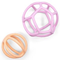 Dwie sensoryczne piłki ażurowe w kolorze różowym i brzoskwiniowym dla dziecka. Jellystone Sensoryczne piłki 2w1 Bubblegum & Peach